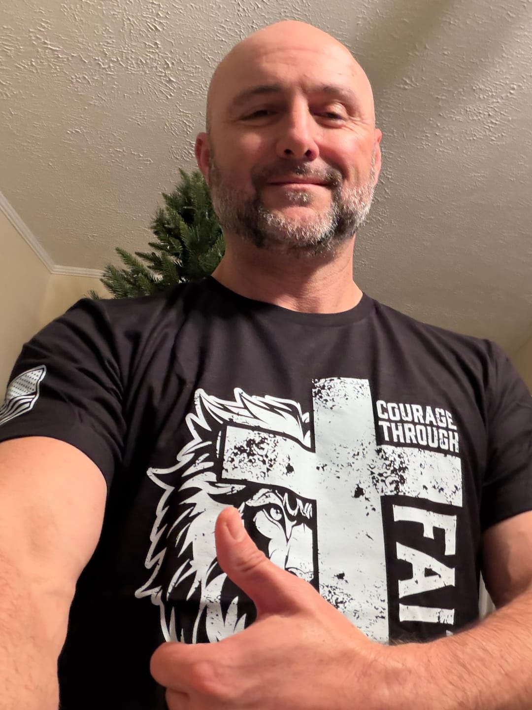 Customer photo review of Courage Through Faith T-Shirt
