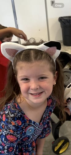 Customer photo review of Tiny Daisy Earrings