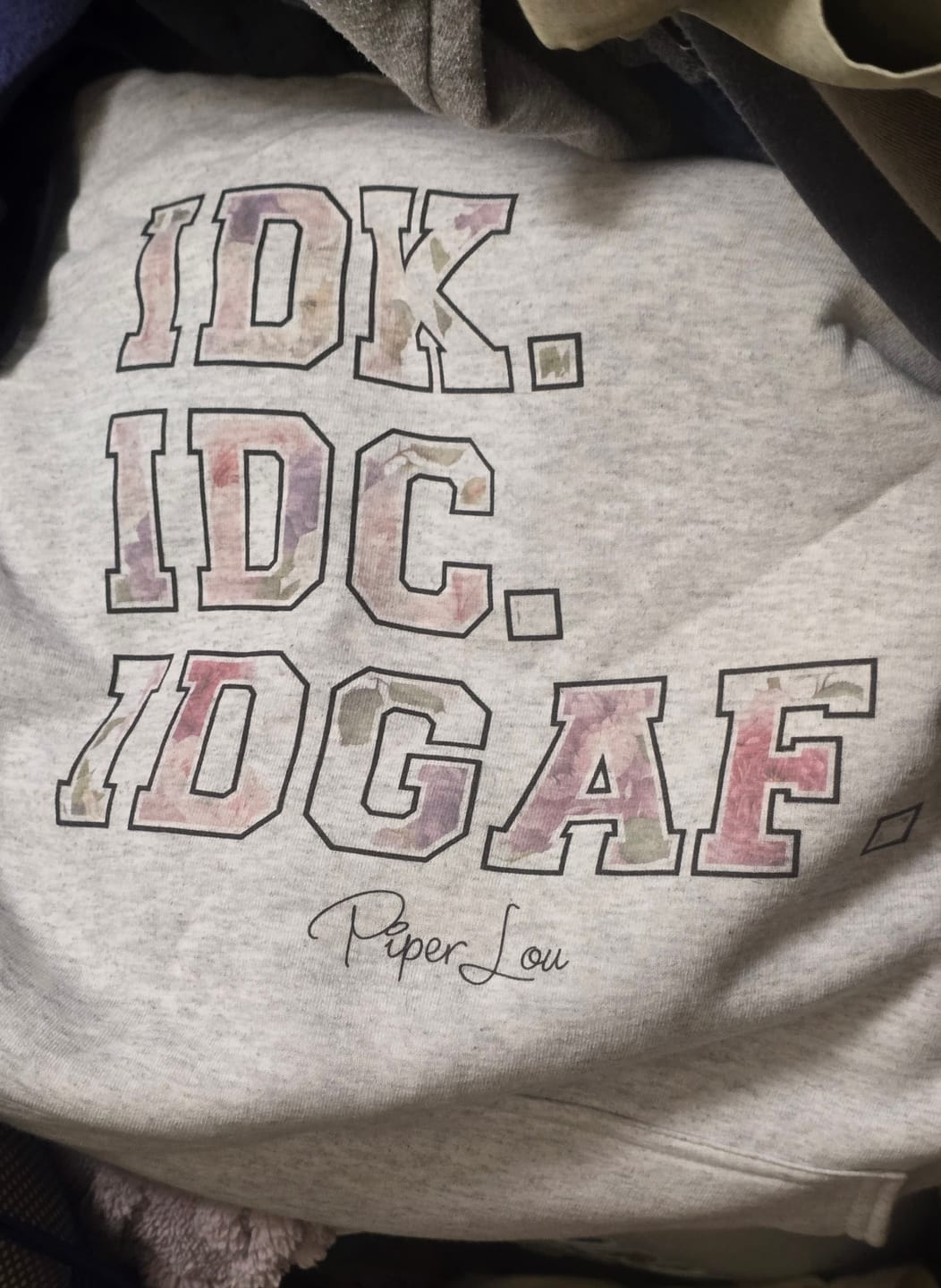 Customer photo review of IDK.IDC.IDGAF. Graphic Tee