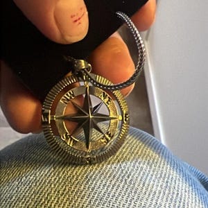 Customer photo review of Compass Pendant