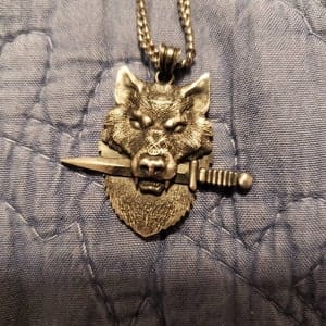 Customer photo review of Wolf Knife Pendant
