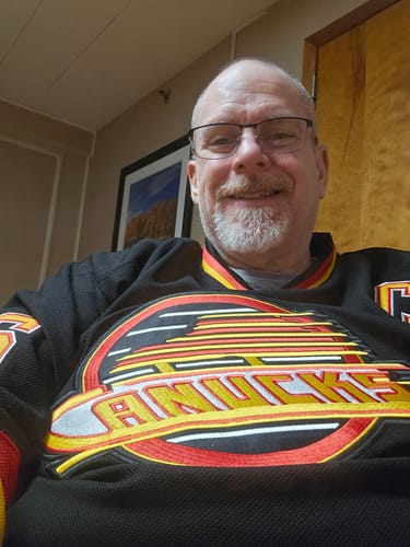 Customer photo review of Men's Vancouver Canucks Trevor Linden #16 Black Breakaway Player Jersey1