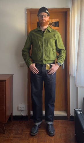 Reviewer's front view of the dark 46801XX 1946 Selvedge Denim Jeans, showing the straight-leg fit with cuffed hems.