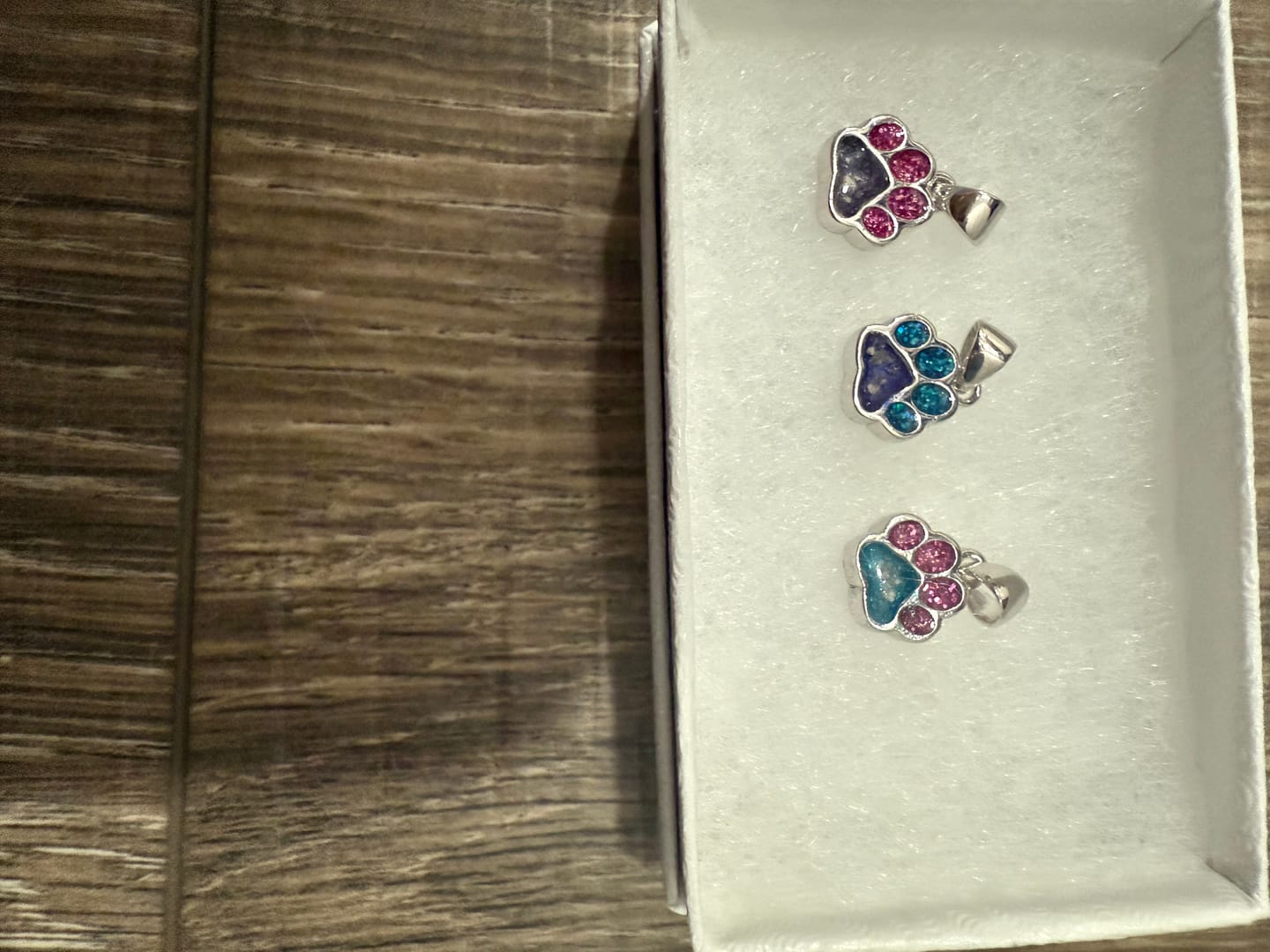 Customer photo review of Dainty Sparkle Toe Pawprint Charm Pendant with Cremation Ashes