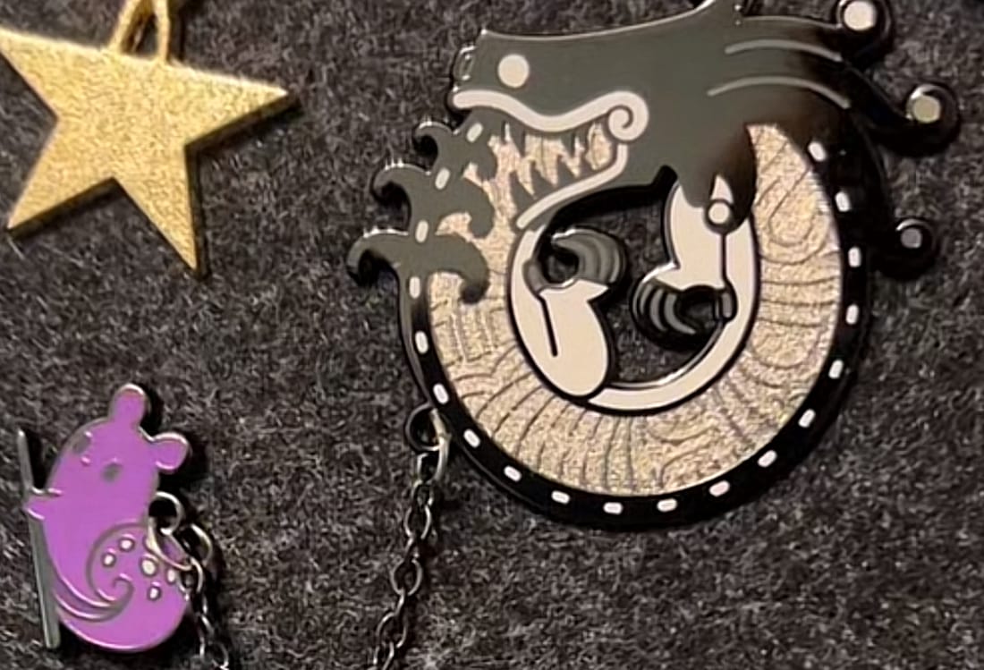 Customer photo review of Rain World - White Lizard Hanger Pin