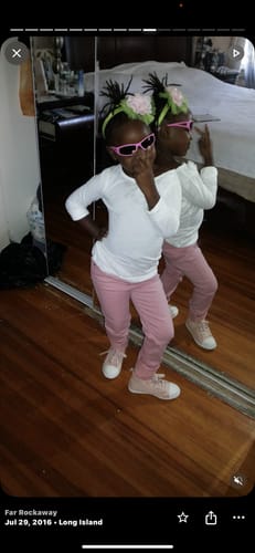 Reviewer's submitted personal photo of a child posing; the Instant Dye Shampoo is not shown.