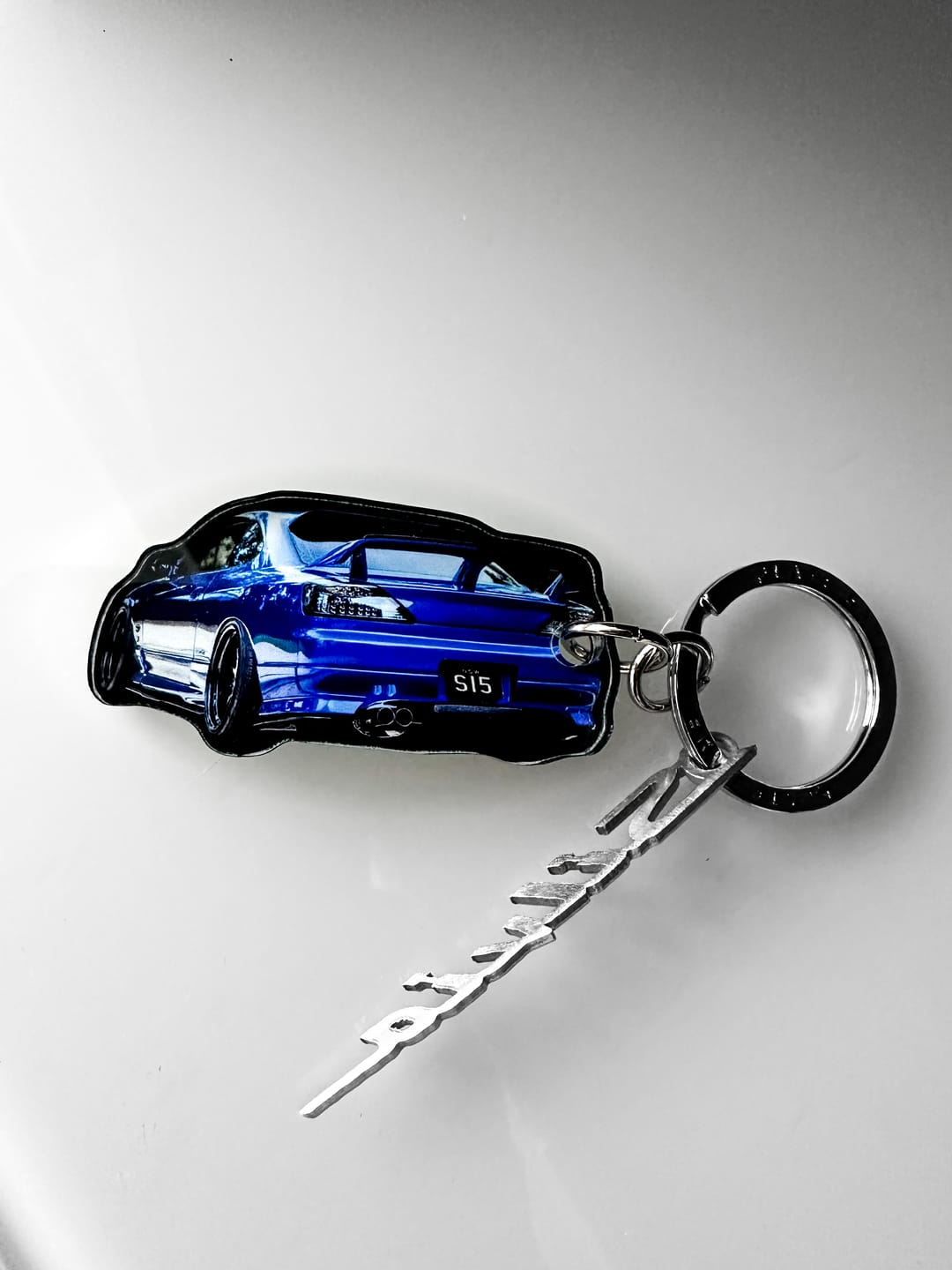 Customer photo review of PG Mini Custom Keychain