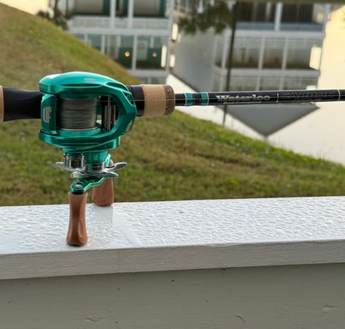 Customer's Waterloo Carbon Mag fishing rod with teal accents, paired with a matching teal reel outdoors.