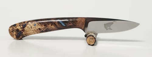 Customer's finished custom knife with a decorative burl wood handle, created using EdgeCore grinding belts.