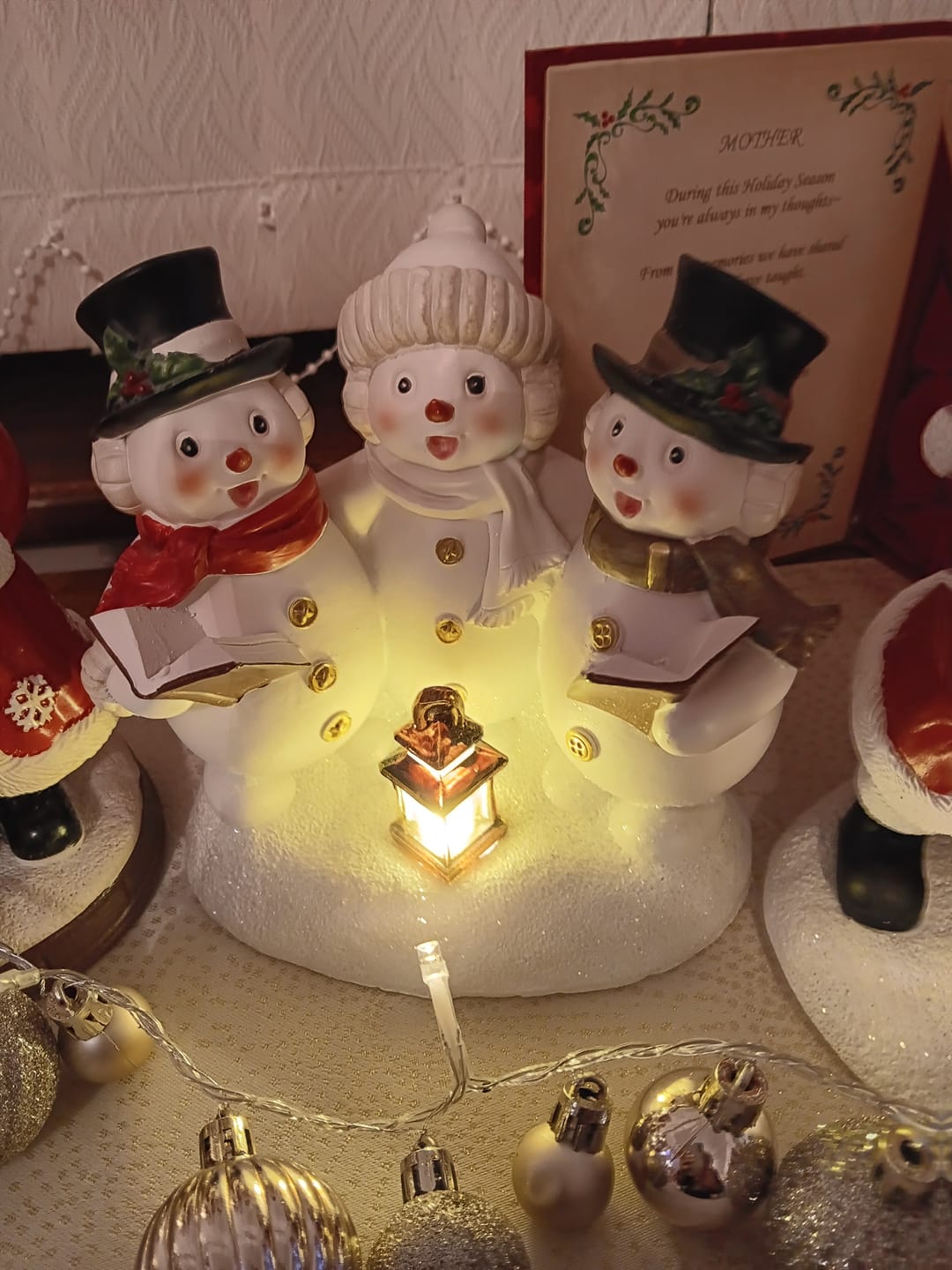 Customer photo review of Aynsley Trio of Snowman Carol Singers LED Figurine