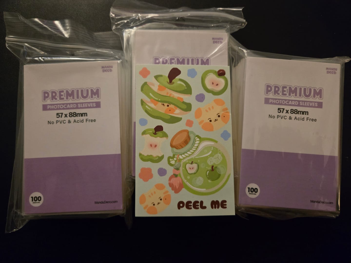 Customer photo review of PREMIUM PHOTOCARD SLEEVES - PURPLE VERSION (57x88MM)