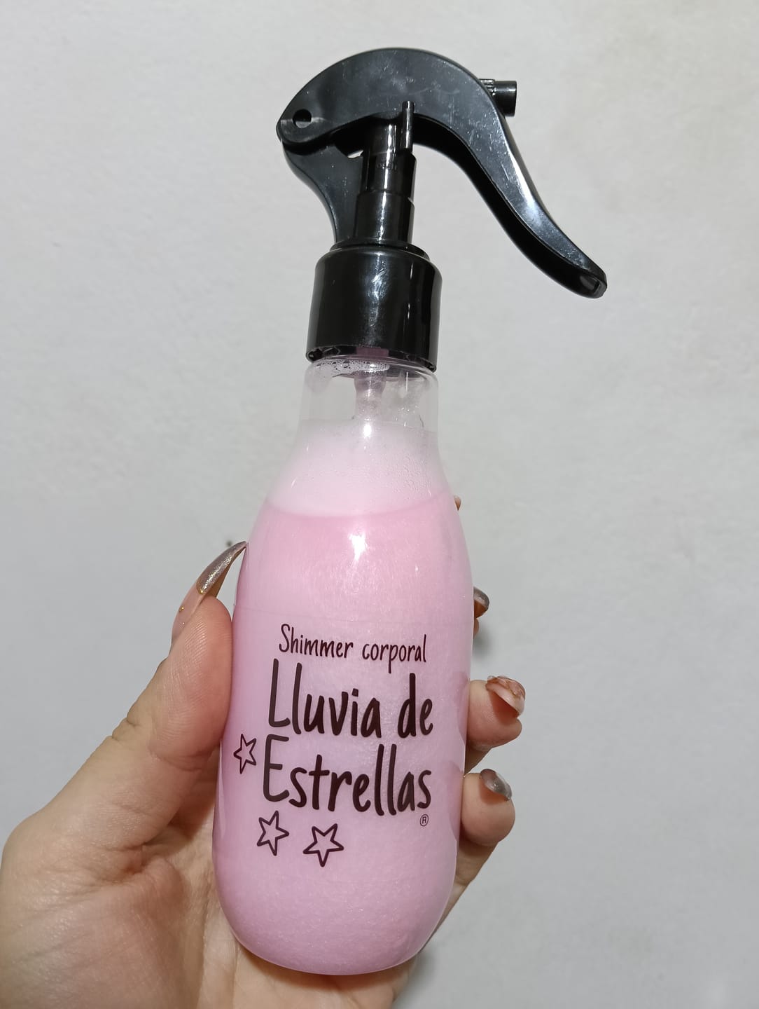 Customer photo review of LLUVIA DE ESTRELLAS SILVER