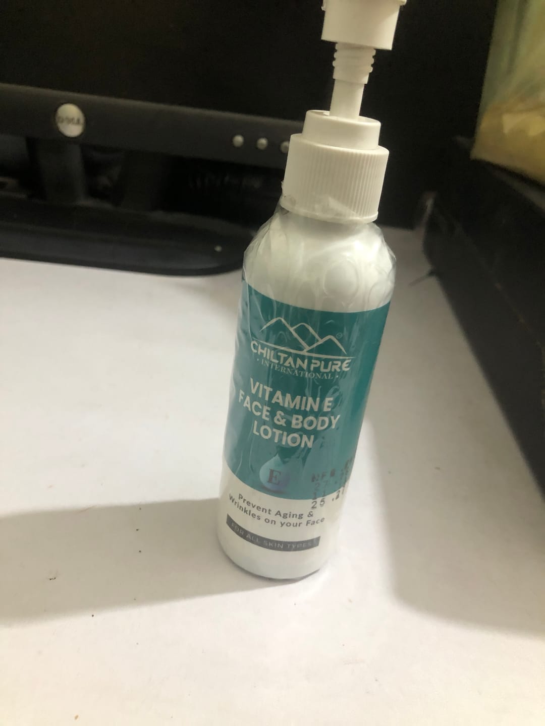 Customer photo review of Vitamin-E Lotion - Used as a Moisturizer To Treat or Prevent Dry, Rough, Scaly, Itchy Skin Minor Skin Irritations (e.g., Diaper rash, Skin Burns From Radiation Therapy)