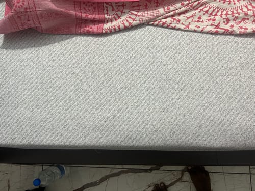 Customer's view of the Flo Anti-Gravity™ Latex Mattress, showing the textured grey fabric cover.