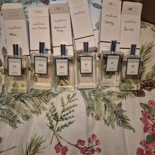 Customer's collection of six 100ml perfume bottles from the set, displayed in a row with their matching boxes.