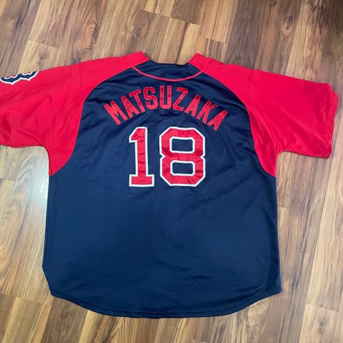 Customer's navy blue and red Matsuzaka 18 baseball jersey from the Pro and College Sports Jerseys mix, laid flat.