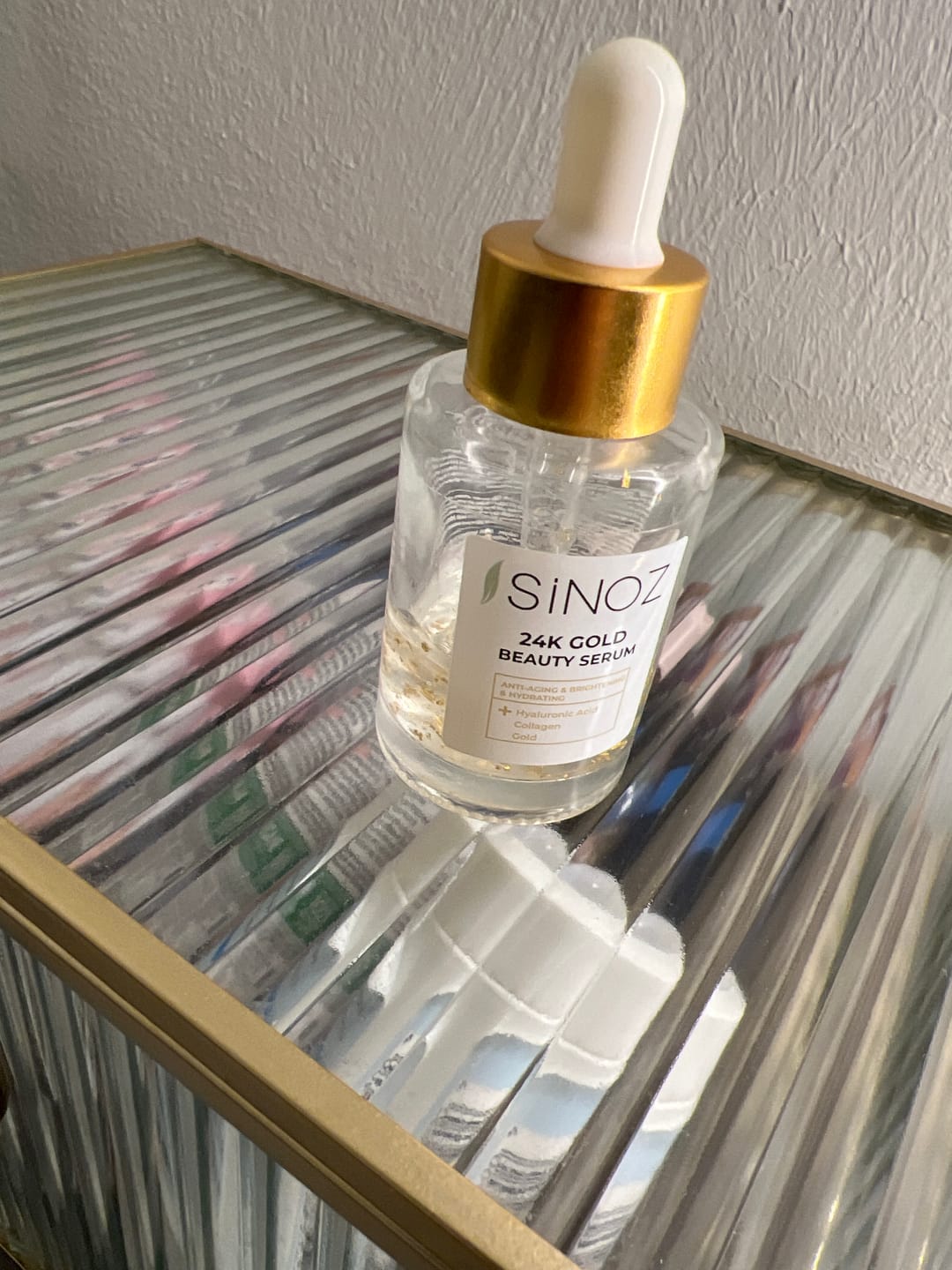 Customer photo review of 24K Gold Beauty Serum