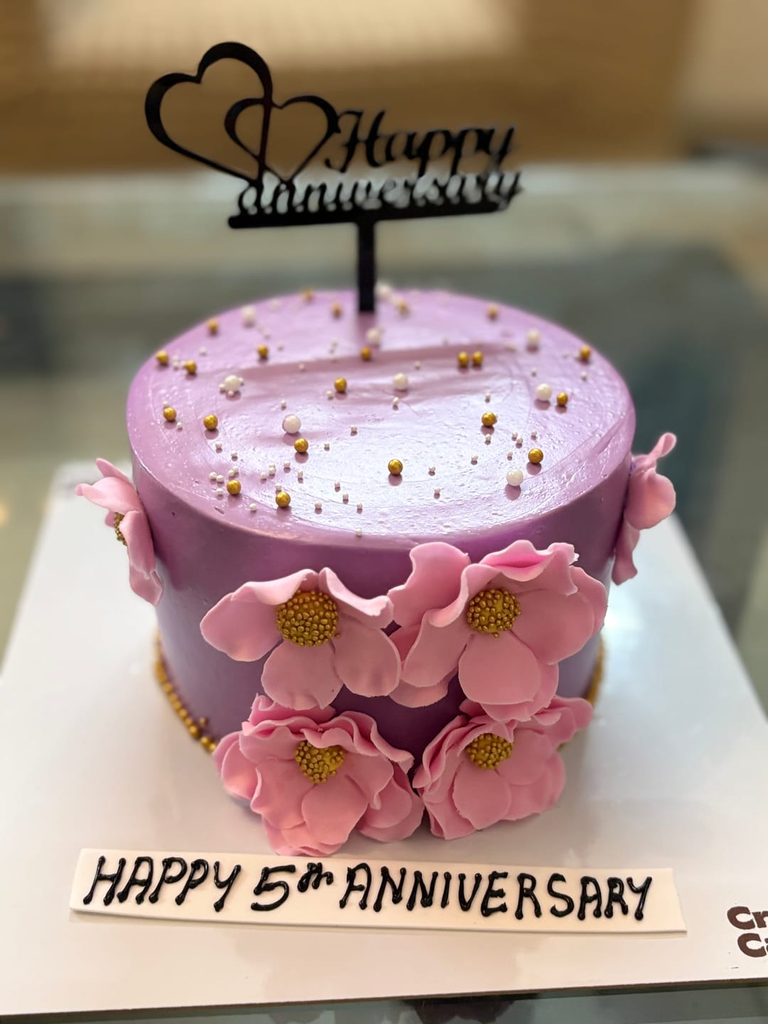 Customer photo review of Floral Purple Anniversary Cake
