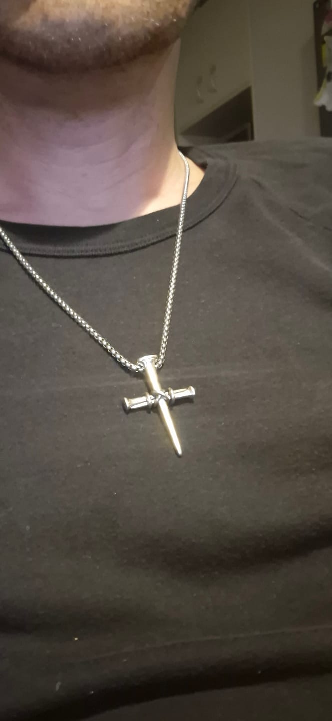 Customer photo review of Christianartworkshop Artistic Nail - Shaped Cross Necklace for Faith Expression