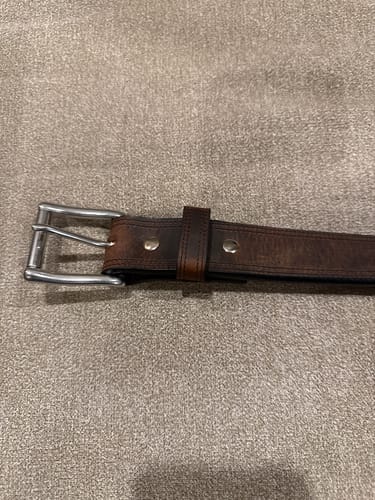 Customer's brown Montana Bison Double Layer belt showing the thick construction and steel roller buckle.