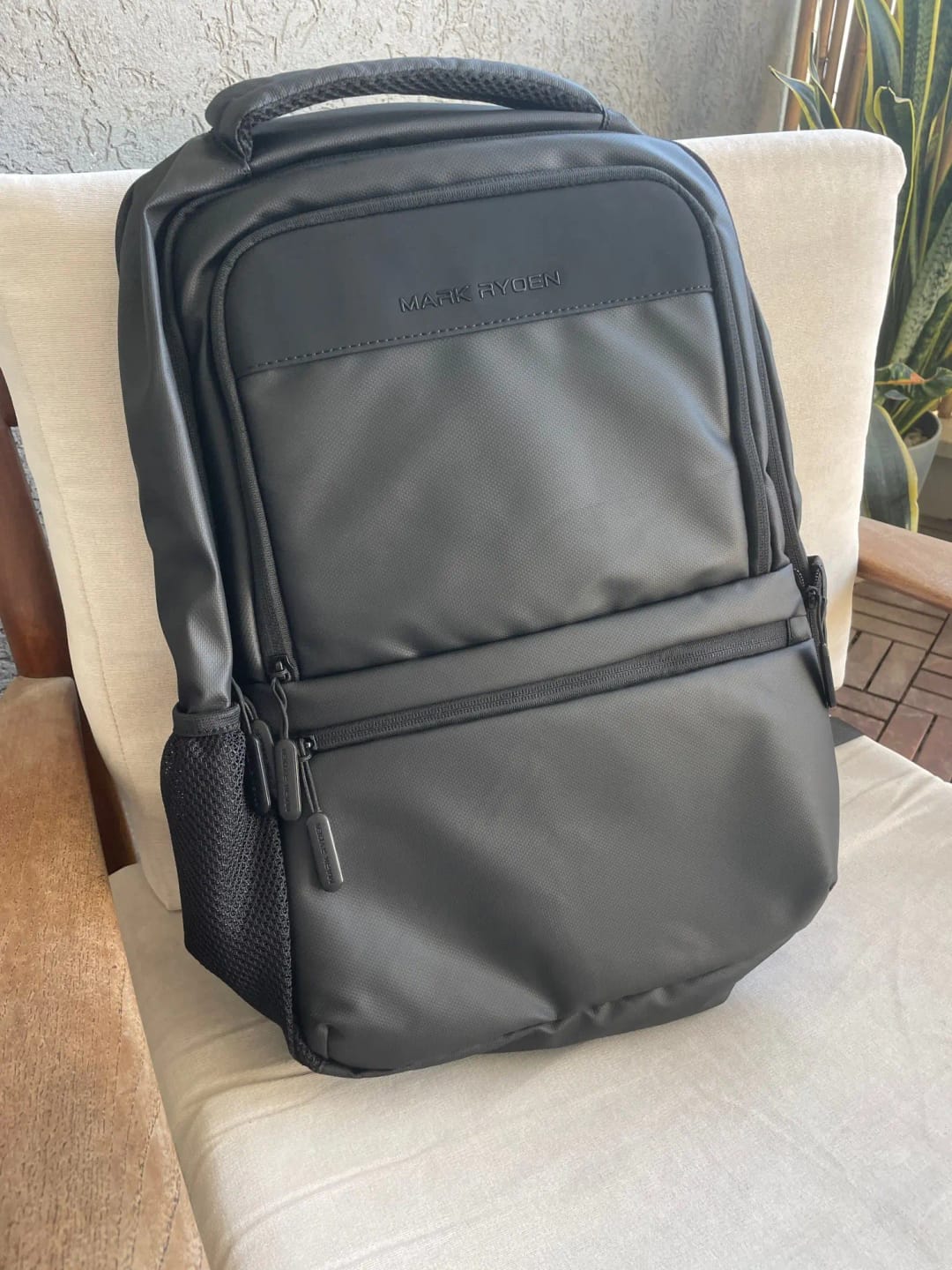 Customer photo review of Mochila Trabalho Masculina Portátil 15.6"