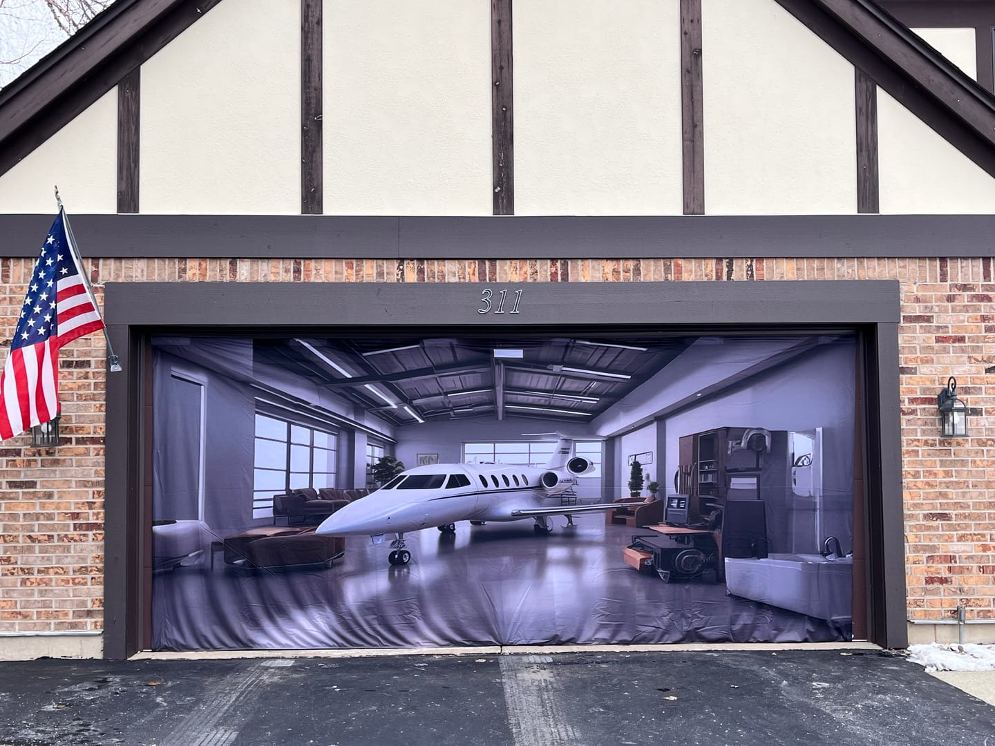 Customer photo review of Luxury Private Jet Parked in the Garage - Garage Door Cover Banner Wrap