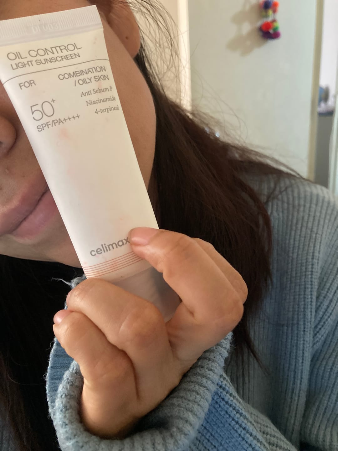 Customer photo review of Oil Control Light Sunscreen