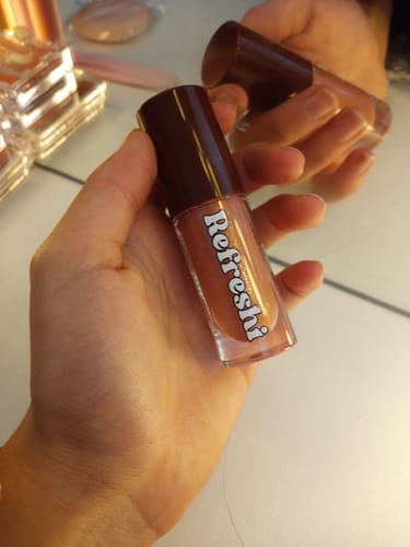 Customer photo review of Tanned Tinted Lip Oil