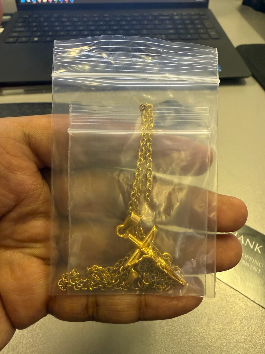 Customer photo review of Gold crucifix necklace
