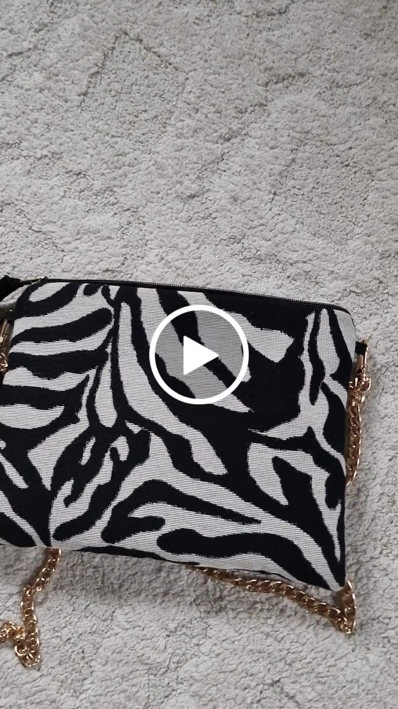Customer video review of Clutch Bag ZEBRA