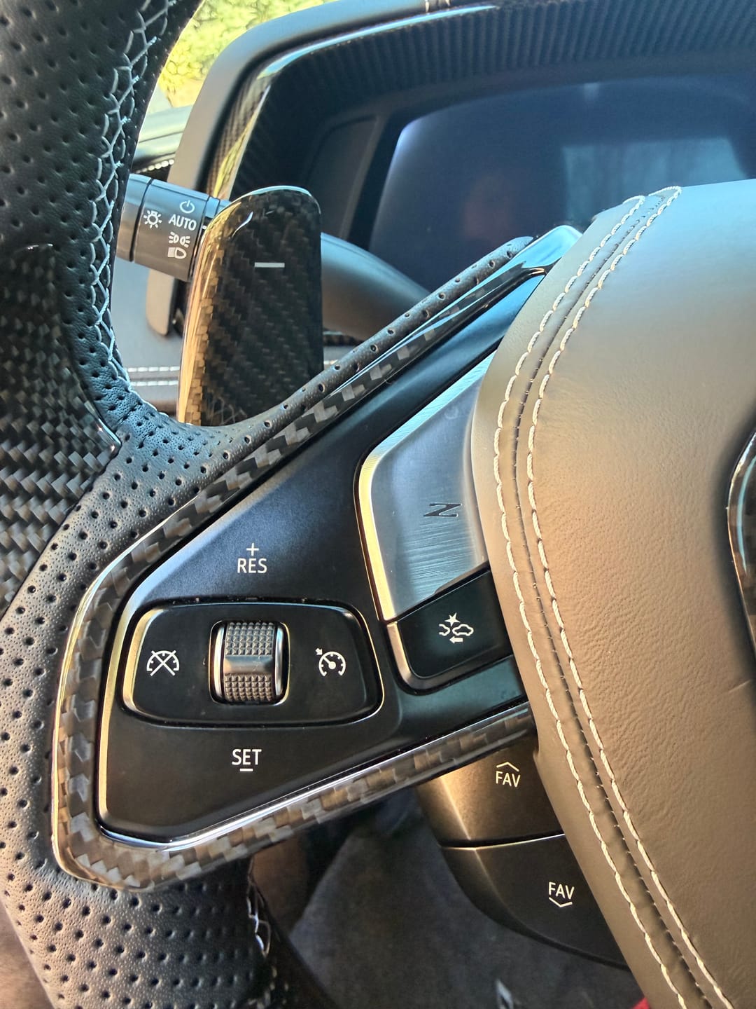 Customer photo review of C8 Corvette Carbon Fiber Steering Chrome Trim Delete Covers