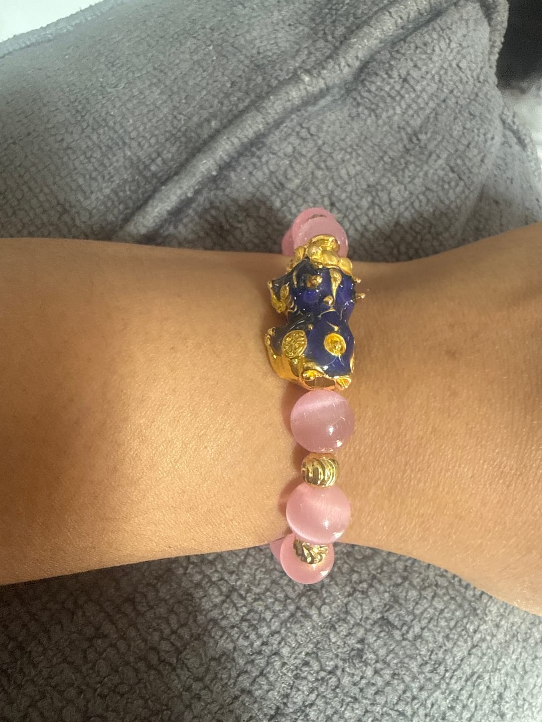 Customer photo review of Color Changing Pixiu Cat Eye Lucky Bracelet