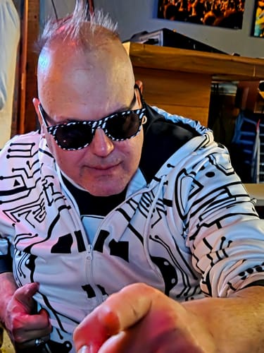 Customer wearing the white Black Circuit Tron Costume Hoodie, which features a bold black circuit pattern.