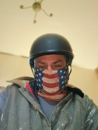 Customer wearing the flat black SOA DOT Beanie helmet, showing its low-profile fit.