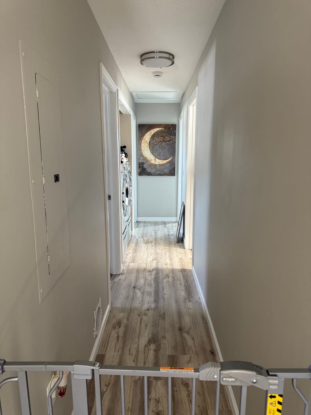 Customer photo review of Luxury Crescent Moon Canvas Wall Decor – Illuminated Gold and Grey Artwork