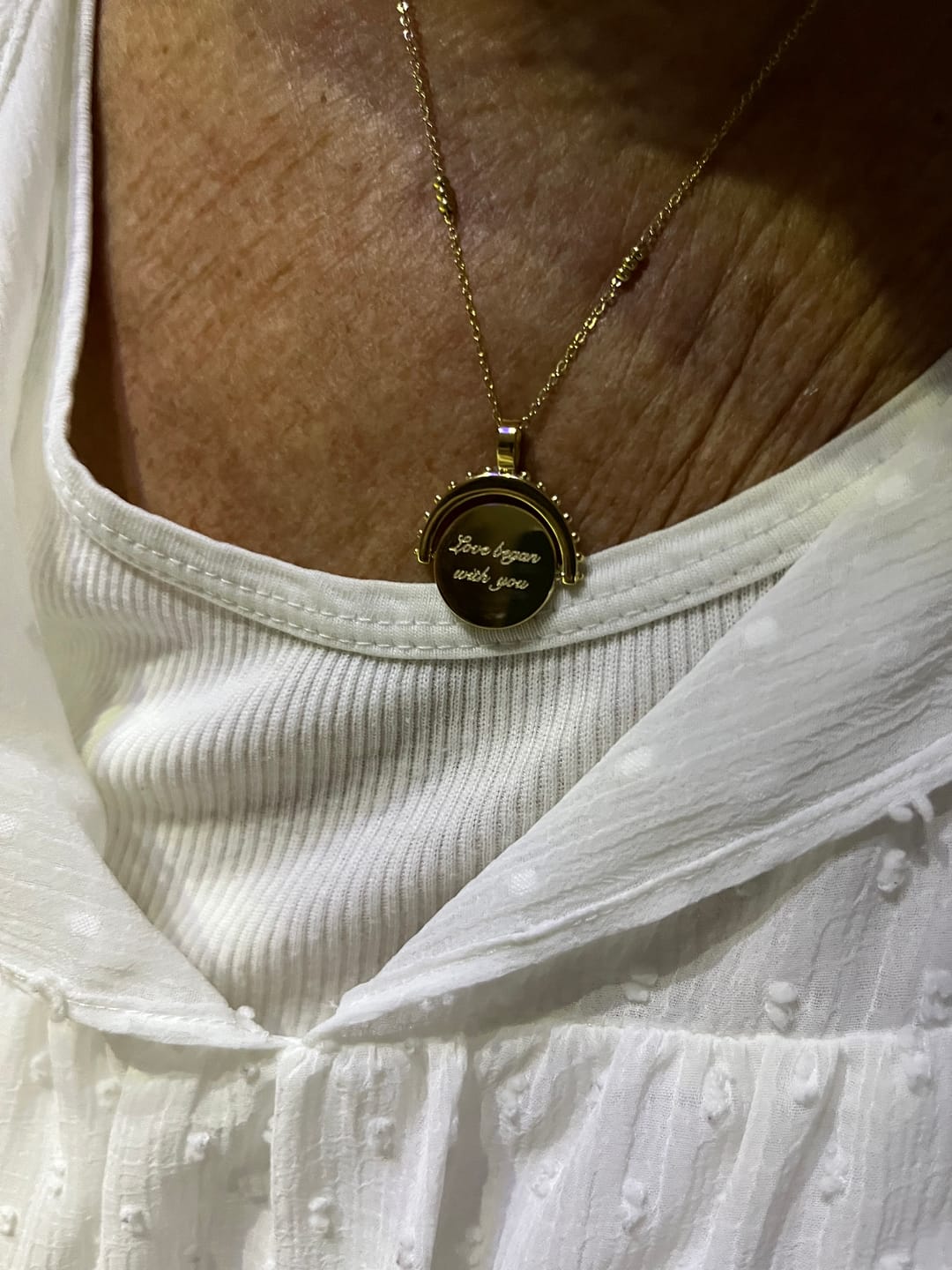 Customer photo review of Engravable Spinning Necklace