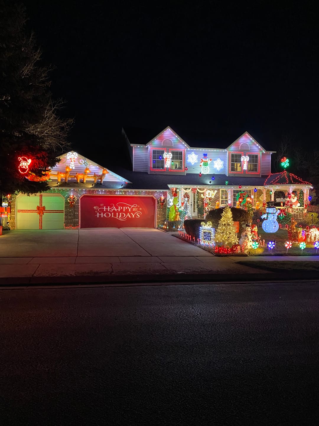 Customer photo review of Happy holidays Greeting with snowflakes Garage Door Cover Banner Wrap