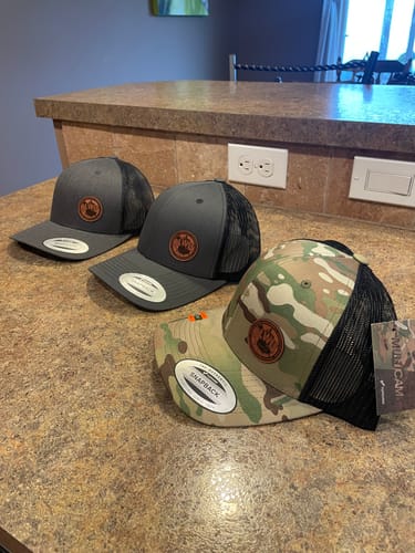 Customer photo review of Custom Leather Patch Trucker Hat - Yupoong 6606