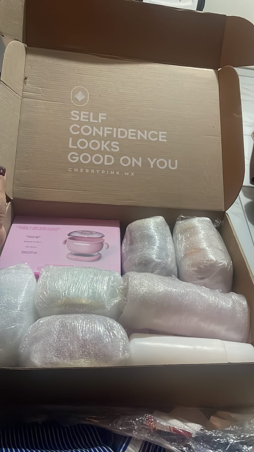 Customer photo review of Kit 1minpretty: 2 tarros de cera + fundidor + refill + exfoliante + crema pepino + agua rosas + talco para depilar con envío gratis mx