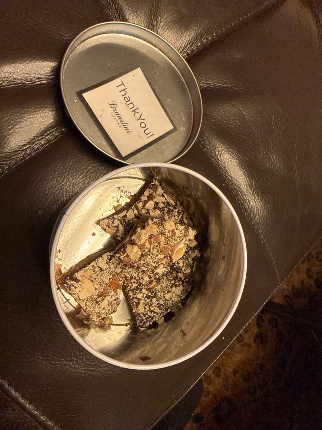 Customer photo review of 1/2 LB Tin Almond Toffee Bites