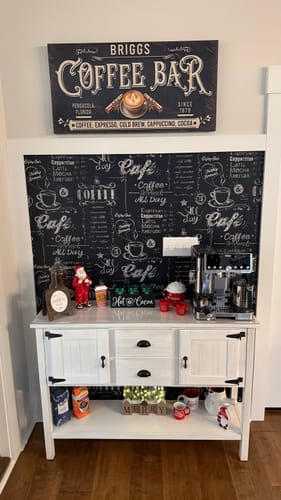 Customer's personalized Tailored Boost sign hanging above their home coffee bar.
