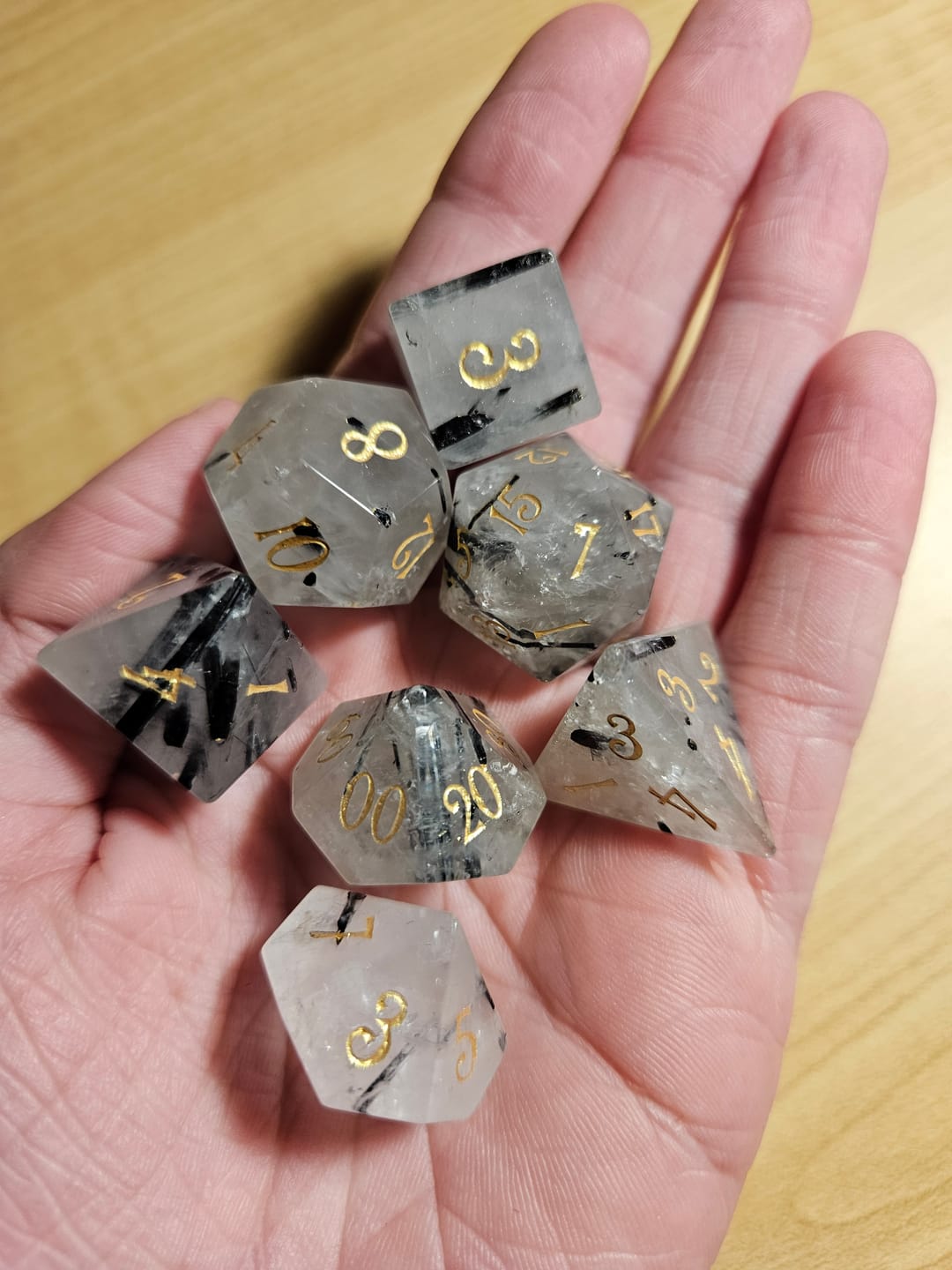 Customer photo review of URWizards D&D Black Rutilated Quartz Gemstone Engraved Dice Set(Limited edition)