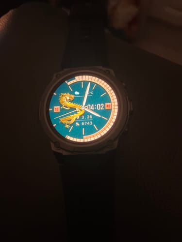 Customer's Gard Pro Ultra 3 with its illuminated screen displaying a custom dragon watch face.
