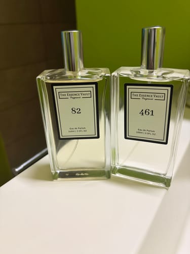 Customer's No. 82 perfume bottle shown with their No. 461 bottle, side-by-side on a counter.