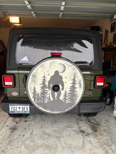 Customer photo review of Walking in the Moonlight Bigfoot Sasquatch Spare Tire Cover for Bronco, Jeep, RV, Camper, Etc.