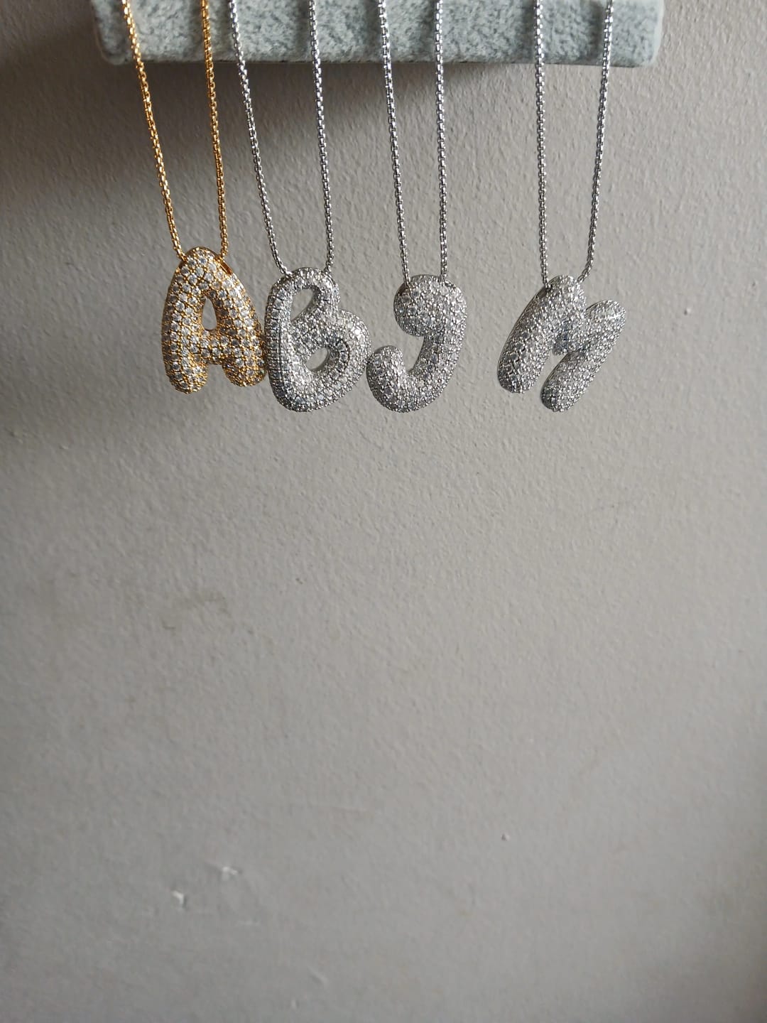 Customer photo review of Gold Bubble Initial Necklace with Sparkling Stone