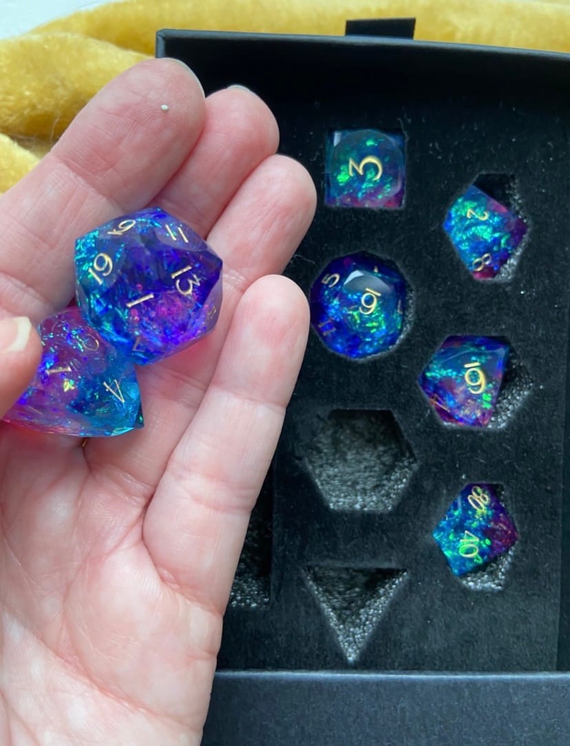 Customer photo review of URWizards D&D Resin Purple Glitter Engraved Dice Set Multi-faceted Gengar Style