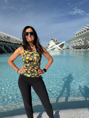Customer posing outdoors in the Orange Fruit Pattern Racerback Tank Top.