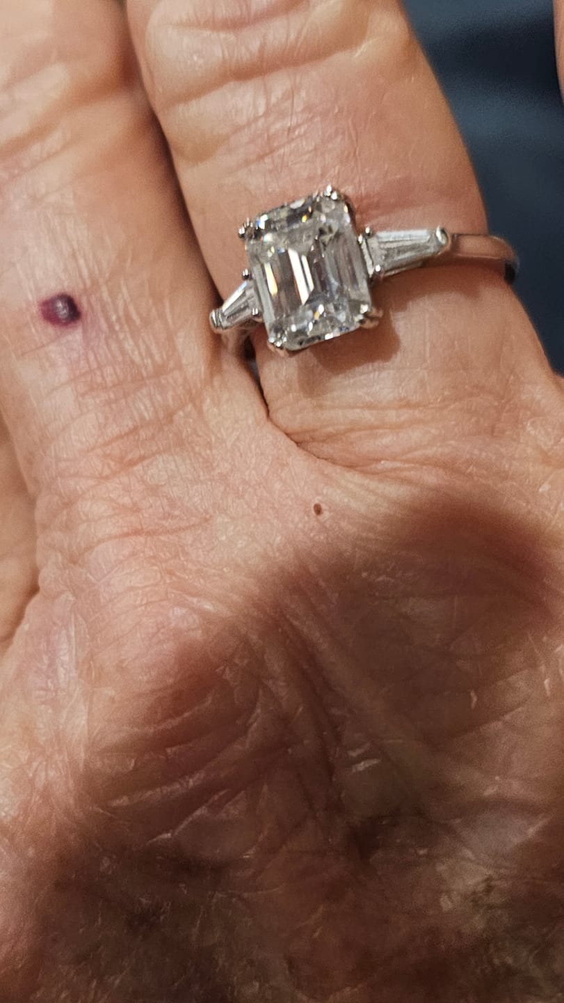 Customer photo review of Three Stone Emerald Cut Moissanite Tapered Baguette Engagement Ring