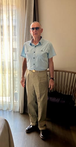 Reviewer showing the full fit of the Military Wash Chambray Short Sleeve Workshirt indoors.